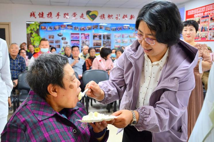 这里，助残“微光如炬”